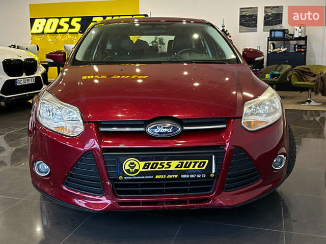 Червоний Форд Фокус, об'ємом двигуна 2 л та пробігом 171 тис. км за 8599 $, фото 1 на Automoto.ua