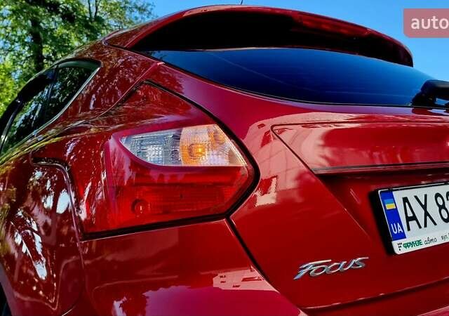 Форд Фокус 2013 в Харькове на Automoto.ua Красный Форд Фокус, объемом двигателя 1 л и пробегом 85 тыс. км за 8470 $, фото 44 на Automoto.ua