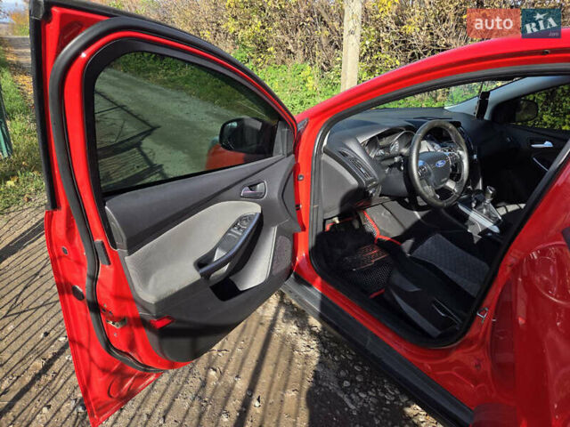 Форд Фокус 2013 в Хмельницком на Automoto.ua Красный Форд Фокус, объемом двигателя 1 л и пробегом 143 тыс. км за 7300 $, фото 12 на Automoto.ua