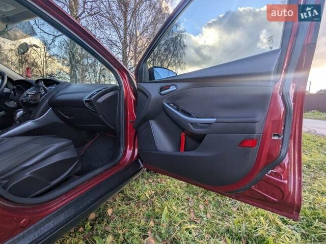 Червоний Форд Фокус, об'ємом двигуна 2 л та пробігом 120 тис. км за 7999 $, фото 9 на Automoto.ua