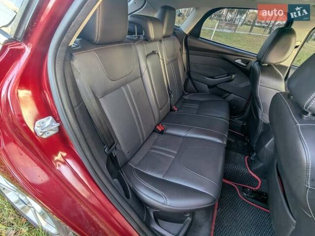 Червоний Форд Фокус, об'ємом двигуна 2 л та пробігом 120 тис. км за 7999 $, фото 10 на Automoto.ua