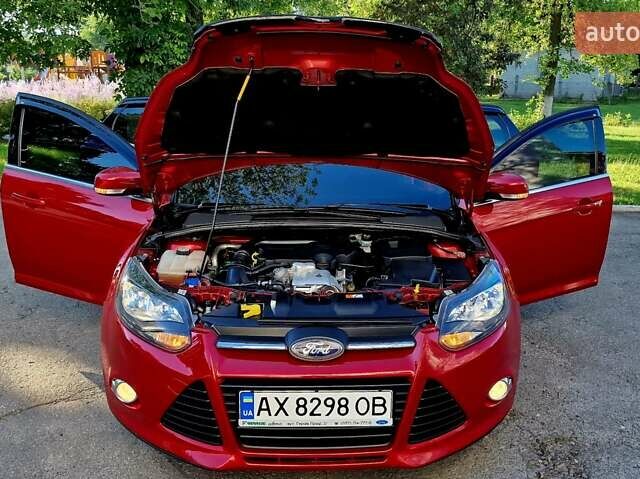 Форд Фокус 2013 в Харькове на Automoto.ua Красный Форд Фокус, объемом двигателя 1 л и пробегом 85 тыс. км за 8470 $, фото 50 на Automoto.ua