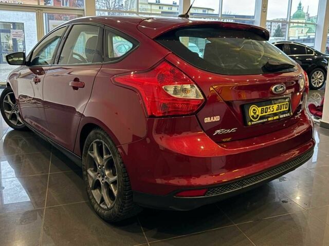 Червоний Форд Фокус, об'ємом двигуна 2 л та пробігом 171 тис. км за 8599 $, фото 4 на Automoto.ua