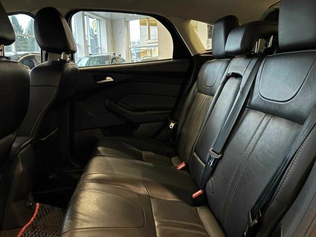 Червоний Форд Фокус, об'ємом двигуна 2 л та пробігом 171 тис. км за 8599 $, фото 19 на Automoto.ua