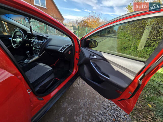 Форд Фокус 2013 в Хмельницком на Automoto.ua Красный Форд Фокус, объемом двигателя 1 л и пробегом 143 тыс. км за 7300 $, фото 14 на Automoto.ua