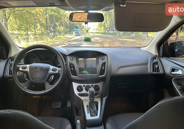 Форд Фокус 2013 в Беляевке на Automoto.ua Красный Форд Фокус, объемом двигателя 2 л и пробегом 138 тыс. км за 7100 $, фото 5 на Automoto.ua