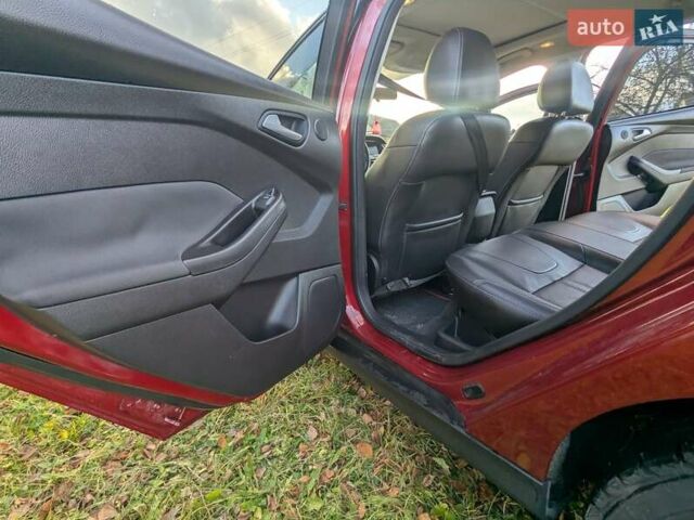 Червоний Форд Фокус, об'ємом двигуна 2 л та пробігом 120 тис. км за 7999 $, фото 16 на Automoto.ua