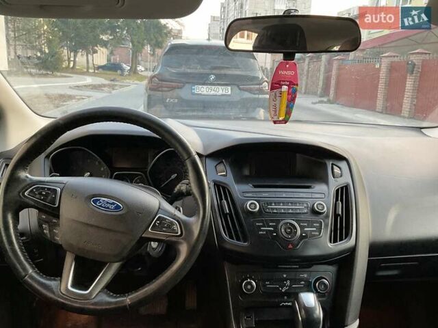 Красный Форд Фокус, объемом двигателя 2 л и пробегом 167 тыс. км за 7300 $, фото 4 на Automoto.ua