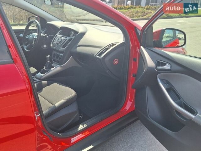 Червоний Форд Фокус, об'ємом двигуна 1 л та пробігом 84 тис. км за 5900 $, фото 6 на Automoto.ua