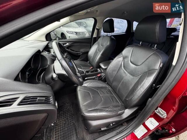 Червоний Форд Фокус, об'ємом двигуна 2 л та пробігом 106 тис. км за 8990 $, фото 9 на Automoto.ua