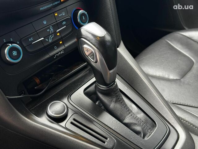 Червоний Форд Фокус, об'ємом двигуна 2 л та пробігом 106 тис. км за 8990 $, фото 12 на Automoto.ua