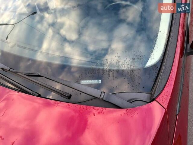 Красный Форд Фокус, объемом двигателя 2 л и пробегом 206 тыс. км за 8500 $, фото 8 на Automoto.ua