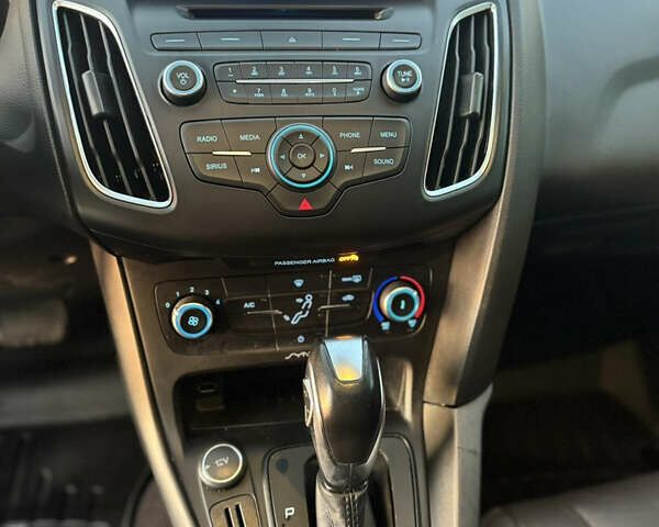 Красный Форд Фокус, объемом двигателя 2 л и пробегом 102 тыс. км за 8500 $, фото 15 на Automoto.ua