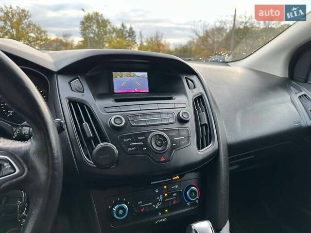 Красный Форд Фокус, объемом двигателя 2 л и пробегом 206 тыс. км за 8500 $, фото 14 на Automoto.ua