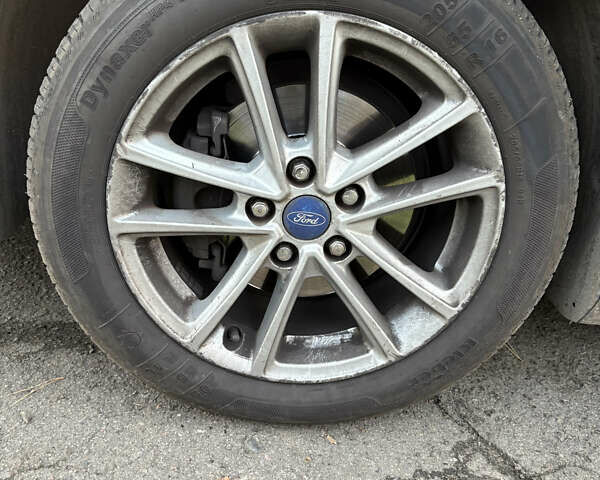 Красный Форд Фокус, объемом двигателя 1 л и пробегом 97 тыс. км за 9300 $, фото 14 на Automoto.ua