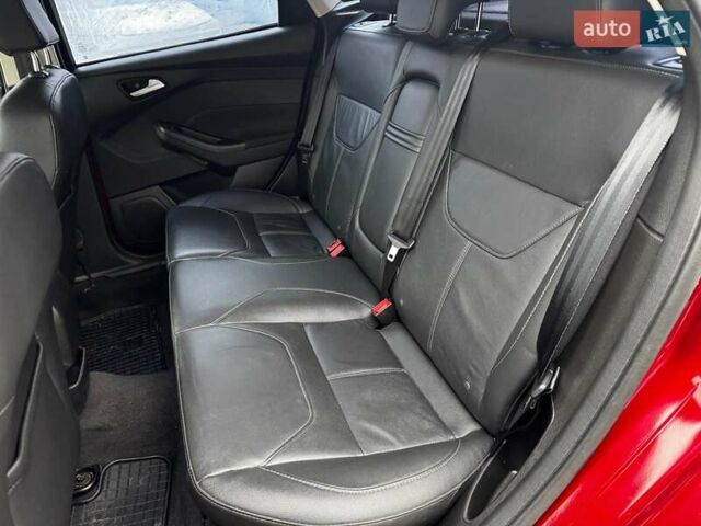 Червоний Форд Фокус, об'ємом двигуна 2 л та пробігом 106 тис. км за 8990 $, фото 17 на Automoto.ua