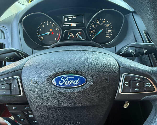 Красный Форд Фокус, объемом двигателя 2 л и пробегом 153 тыс. км за 7600 $, фото 12 на Automoto.ua