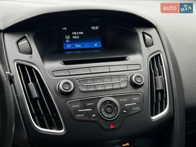 Червоний Форд Фокус, об'ємом двигуна 2 л та пробігом 106 тис. км за 8990 $, фото 14 на Automoto.ua