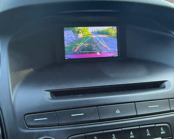 Красный Форд Фокус, объемом двигателя 2 л и пробегом 153 тыс. км за 7600 $, фото 14 на Automoto.ua