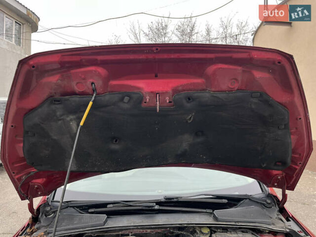 Червоний Форд Фокус, об'ємом двигуна 2 л та пробігом 219 тис. км за 8500 $, фото 53 на Automoto.ua