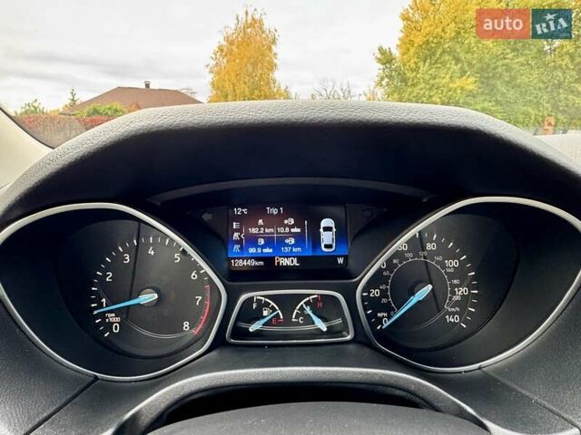 Красный Форд Фокус, объемом двигателя 2 л и пробегом 128 тыс. км за 8950 $, фото 20 на Automoto.ua