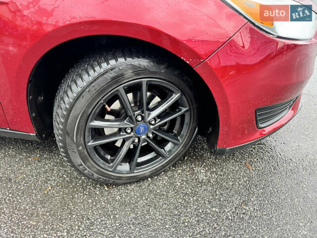 Красный Форд Фокус, объемом двигателя 2 л и пробегом 160 тыс. км за 8200 $, фото 5 на Automoto.ua