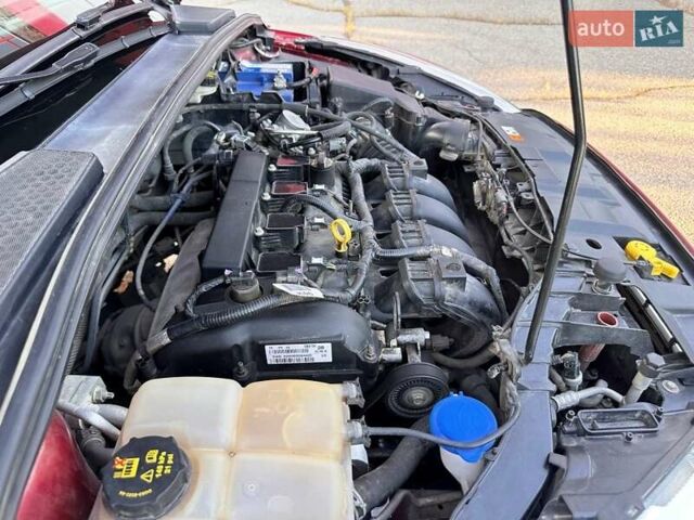 Красный Форд Фокус, объемом двигателя 2 л и пробегом 214 тыс. км за 8800 $, фото 11 на Automoto.ua