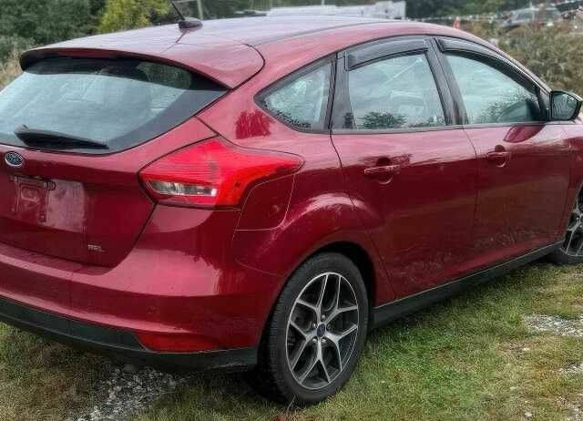 Красный Форд Фокус, объемом двигателя 2 л и пробегом 78 тыс. км за 7000 $, фото 5 на Automoto.ua