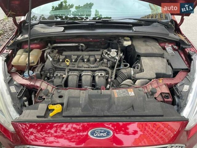 Красный Форд Фокус, объемом двигателя 2 л и пробегом 115 тыс. км за 11950 $, фото 14 на Automoto.ua