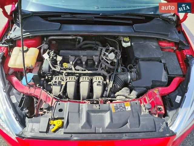 Червоний Форд Фокус, об'ємом двигуна 2 л та пробігом 149 тис. км за 7777 $, фото 23 на Automoto.ua