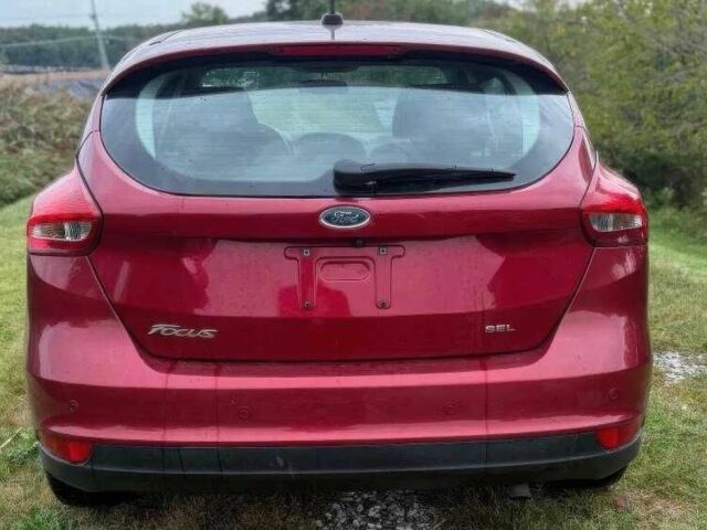 Красный Форд Фокус, объемом двигателя 2 л и пробегом 78 тыс. км за 7000 $, фото 4 на Automoto.ua