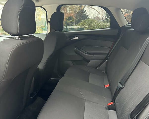 Червоний Форд Фокус, об'ємом двигуна 2 л та пробігом 89 тис. км за 11200 $, фото 16 на Automoto.ua