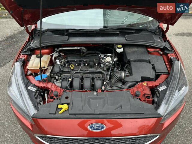 Червоний Форд Фокус, об'ємом двигуна 2 л та пробігом 89 тис. км за 11200 $, фото 18 на Automoto.ua
