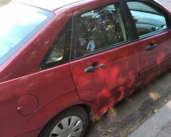 Красный Форд Фокус, объемом двигателя 2 л и пробегом 260 тыс. км за 3100 $, фото 7 на Automoto.ua