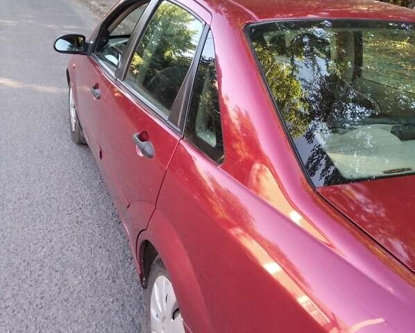 Красный Форд Фокус, объемом двигателя 2 л и пробегом 260 тыс. км за 3100 $, фото 8 на Automoto.ua