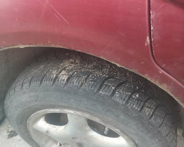 Красный Форд Фокус, объемом двигателя 1.6 л и пробегом 266 тыс. км за 1700 $, фото 3 на Automoto.ua