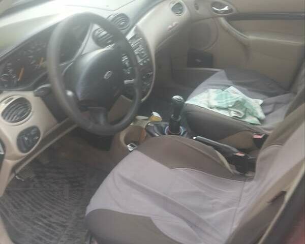 Красный Форд Фокус, объемом двигателя 1.6 л и пробегом 266 тыс. км за 1700 $, фото 2 на Automoto.ua