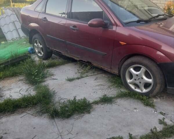 Красный Форд Фокус, объемом двигателя 1.6 л и пробегом 266 тыс. км за 1700 $, фото 1 на Automoto.ua