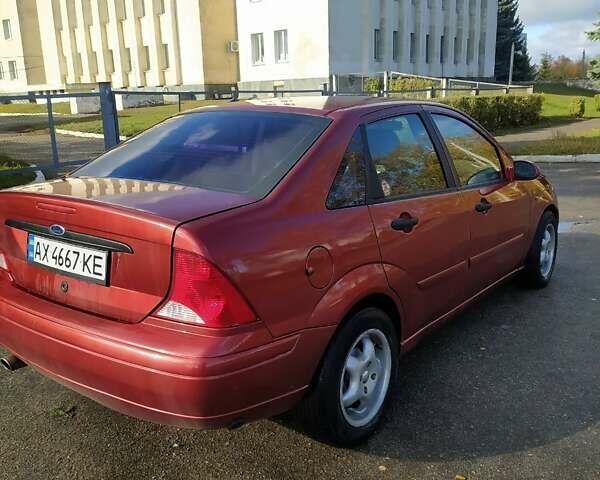 Красный Форд Фокус, объемом двигателя 2 л и пробегом 200 тыс. км за 2700 $, фото 1 на Automoto.ua