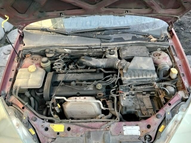 Червоний Форд Фокус, об'ємом двигуна 1.8 л та пробігом 2 тис. км за 1000 $, фото 9 на Automoto.ua