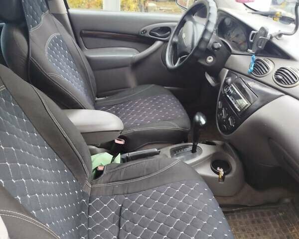 Красный Форд Фокус, объемом двигателя 2.02 л и пробегом 295 тыс. км за 2500 $, фото 3 на Automoto.ua