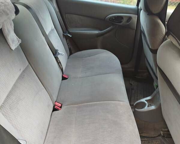 Красный Форд Фокус, объемом двигателя 2.02 л и пробегом 295 тыс. км за 2500 $, фото 5 на Automoto.ua