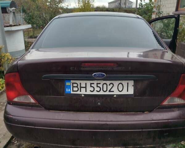 Красный Форд Фокус, объемом двигателя 2.02 л и пробегом 295 тыс. км за 2500 $, фото 4 на Automoto.ua