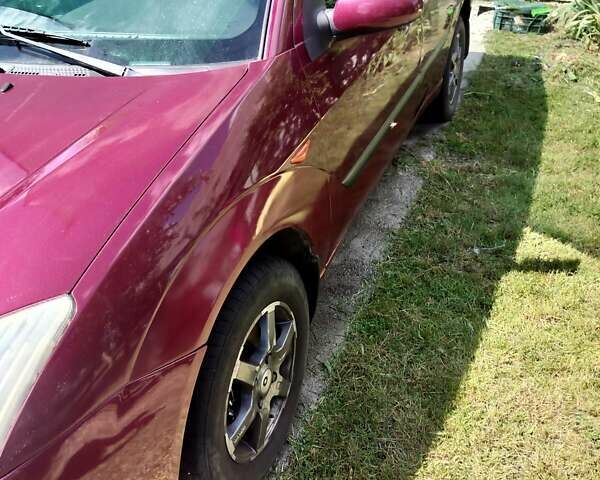 Красный Форд Фокус, объемом двигателя 1.6 л и пробегом 539 тыс. км за 3000 $, фото 3 на Automoto.ua