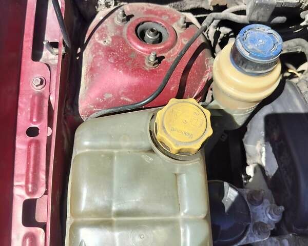 Красный Форд Фокус, объемом двигателя 1.6 л и пробегом 539 тыс. км за 3000 $, фото 16 на Automoto.ua