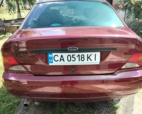 Красный Форд Фокус, объемом двигателя 1.6 л и пробегом 539 тыс. км за 3000 $, фото 1 на Automoto.ua