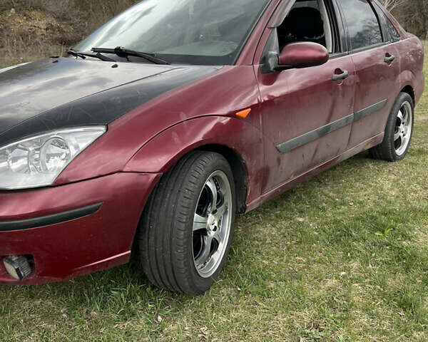 Красный Форд Фокус, объемом двигателя 1.8 л и пробегом 250 тыс. км за 2999 $, фото 10 на Automoto.ua