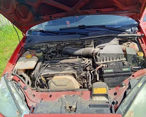 Красный Форд Фокус, объемом двигателя 1.8 л и пробегом 361 тыс. км за 2800 $, фото 19 на Automoto.ua