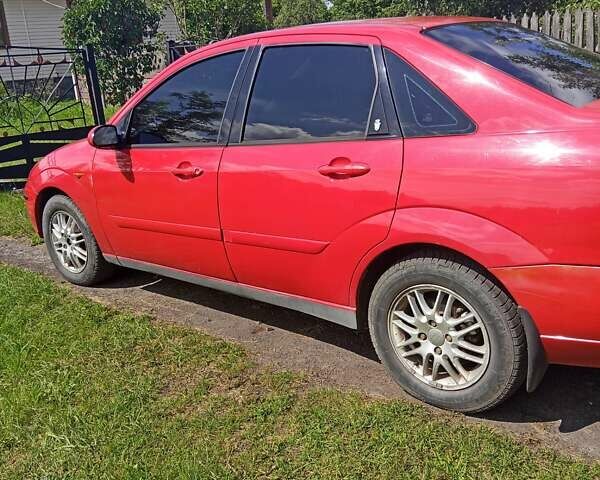 Красный Форд Фокус, объемом двигателя 1.8 л и пробегом 361 тыс. км за 2800 $, фото 5 на Automoto.ua