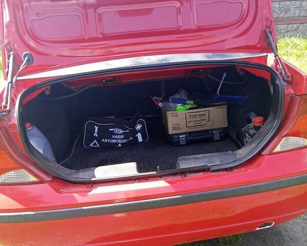 Красный Форд Фокус, объемом двигателя 1.8 л и пробегом 361 тыс. км за 2800 $, фото 6 на Automoto.ua